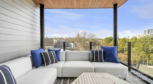 a balcony with furniture