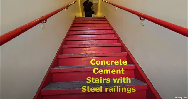 a view of a hallway with wooden shelves