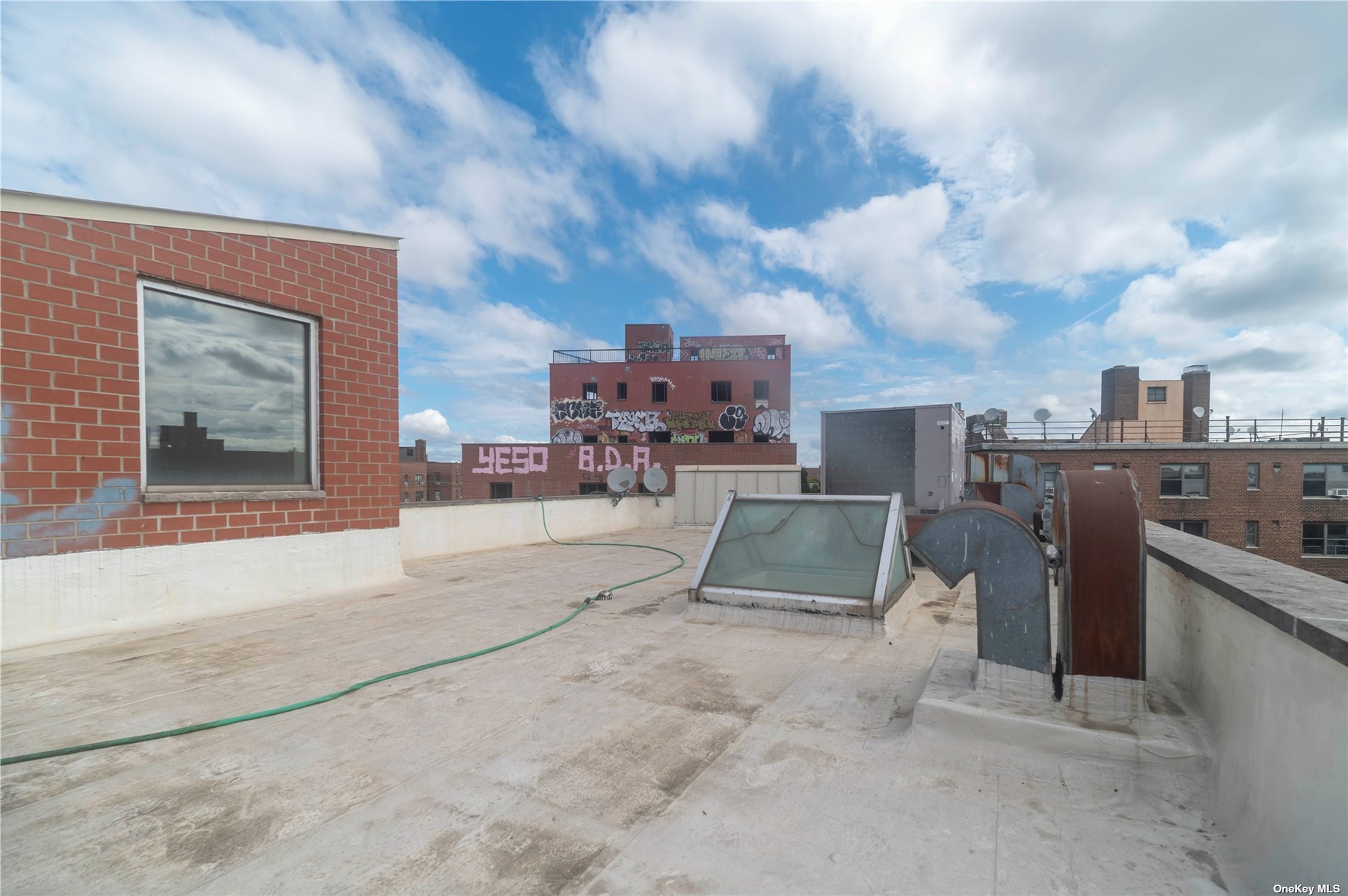 83-17 Broadway Queens, NY 11373 - Photo 20 of 27 a view of a kitchen with furniture and a kitchen