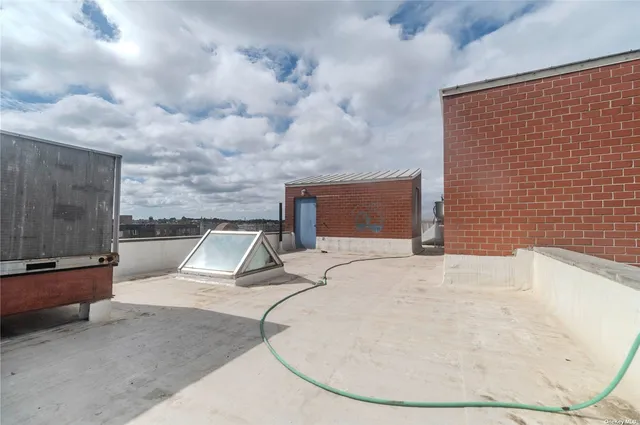 a view of a car park in front of building