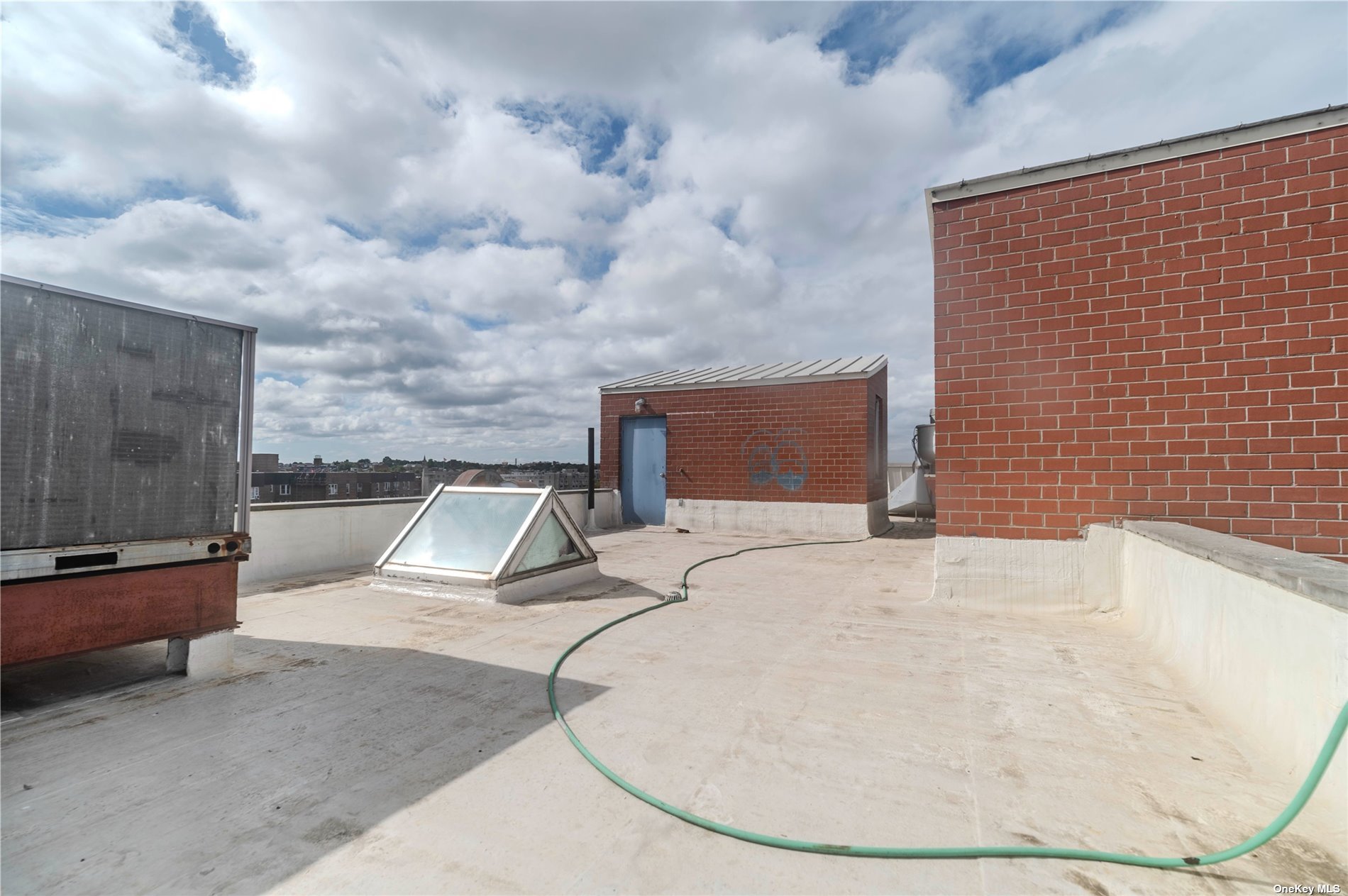 83-17 Broadway Queens, NY 11373 - Photo 24 of 27 a view of a swimming pool with seating area