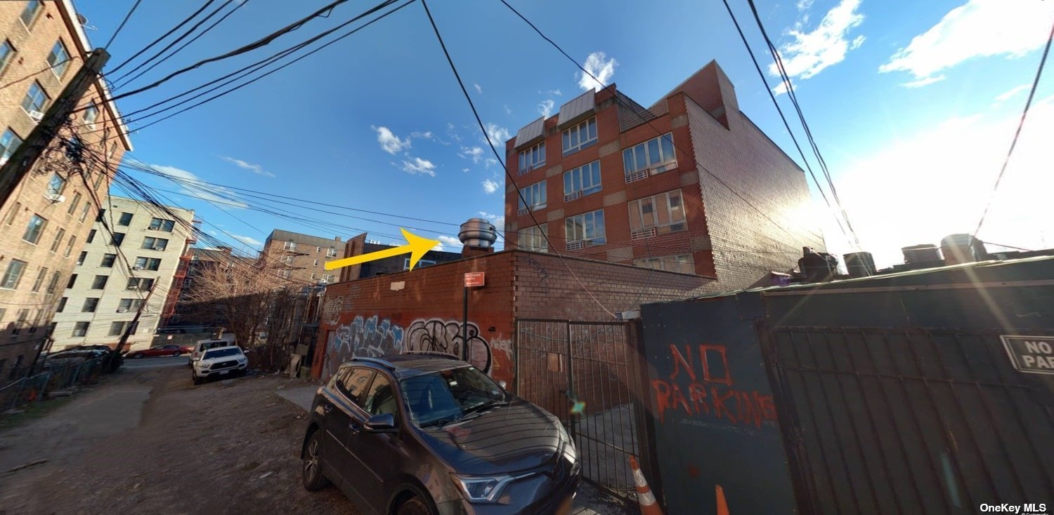83-17 Broadway Queens, NY 11373 - Photo 25 of 27 a view of a car park in front of building