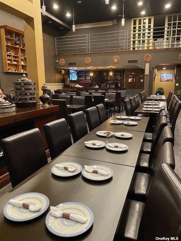 83-17 Broadway Queens, NY 11373 - Photo 9 of 27 a kitchen with furniture and view of kitchen