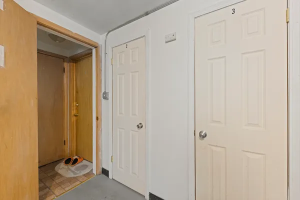 a view of a bathroom with a sink and a mirror