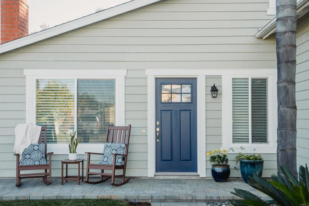 4435 Springtime Drive Oceanside, CA 92056 - Photo 20 of 22 a backyard of a house with outdoor seating