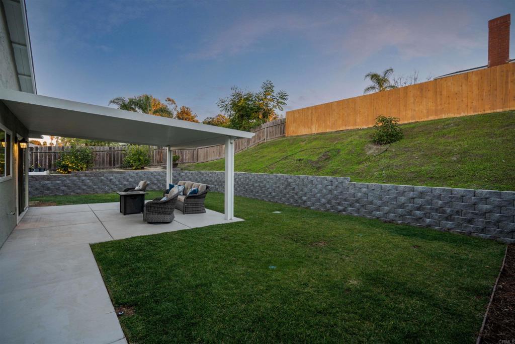 4435 Springtime Drive Oceanside, CA 92056 - Photo 22 of 22 a view of a backyard with sitting area