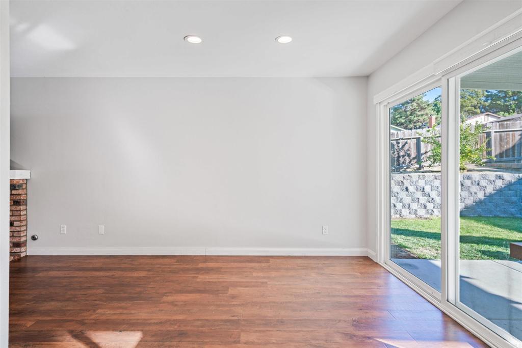 4435 Springtime Drive Oceanside, CA 92056 - Photo 10 of 22 a view of a room with wooden floor and window