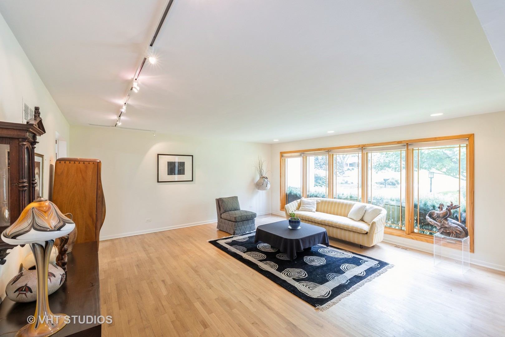855 Beverly Place Lake Forest, IL 60045 - Photo 5 of 21 a living room with furniture and a large window