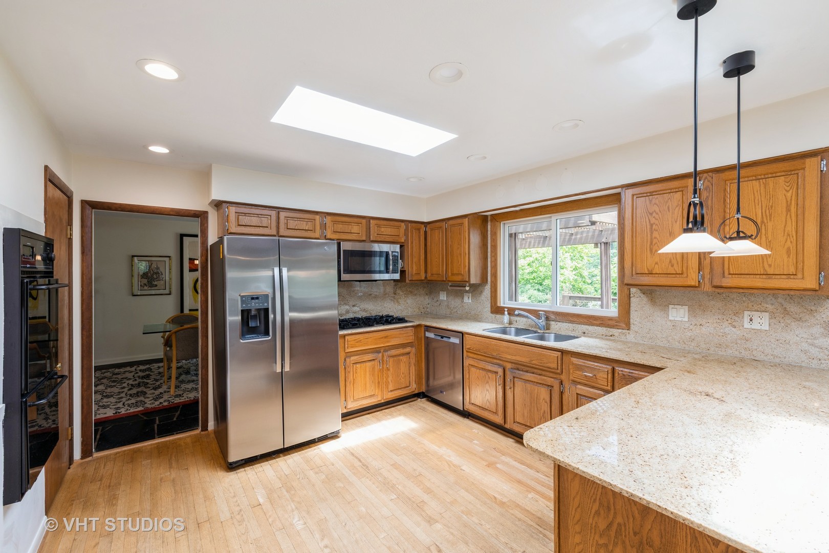 855 Beverly Place Lake Forest, IL 60045 - Photo 8 of 21 a kitchen with stainless steel appliances granite countertop a refrigerator and a sink
