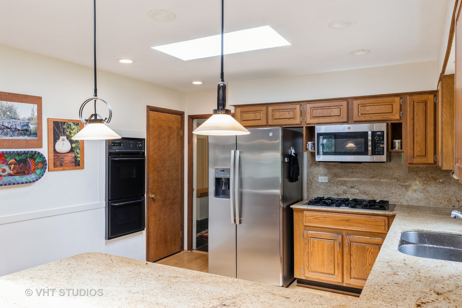 855 Beverly Place Lake Forest, IL 60045 - Photo 9 of 21 a kitchen with stainless steel appliances granite countertop a refrigerator and a sink