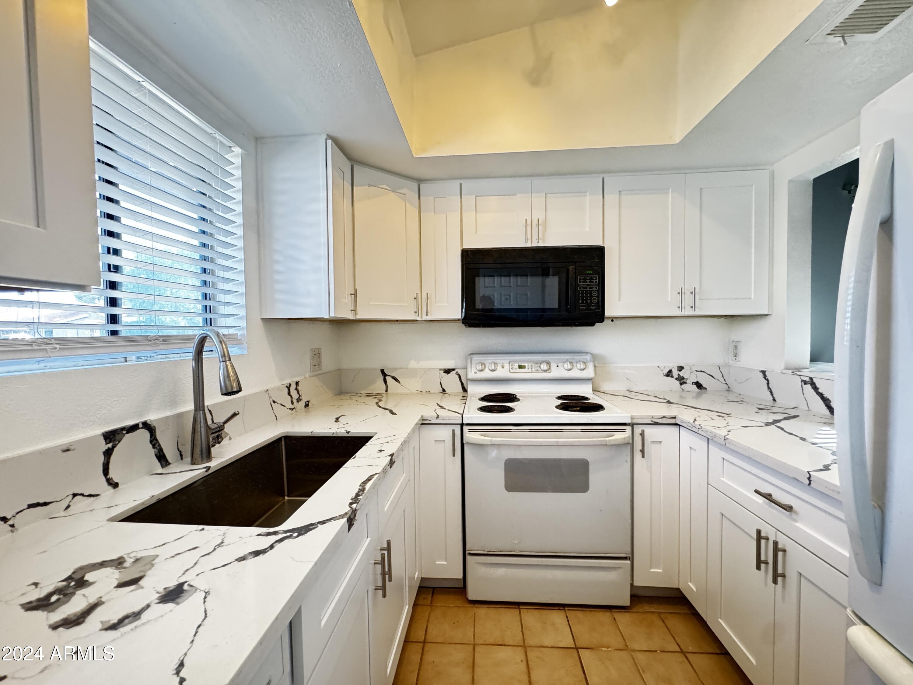 406 East Cullumber Avenue, Unit A Gilbert, AZ 85234 - Photo 1 of 17 IMG_1236