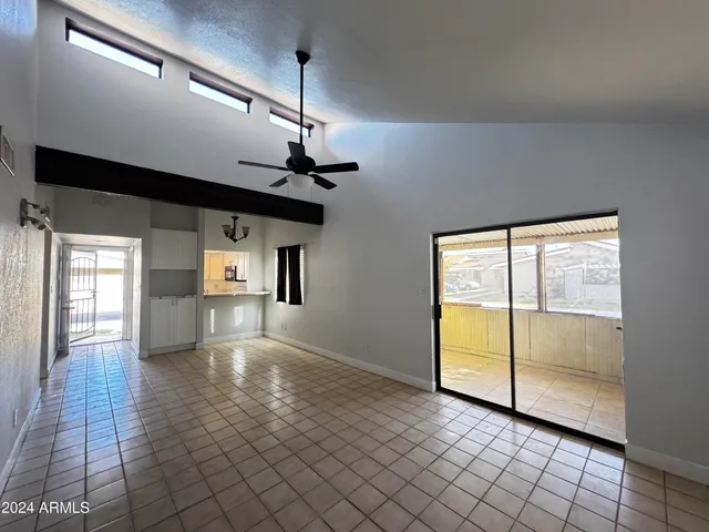 a view of an empty room and window