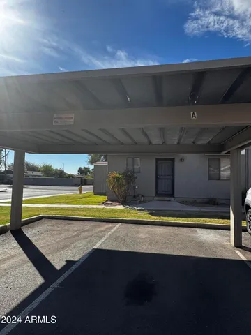 a view of swimming pool with a yard