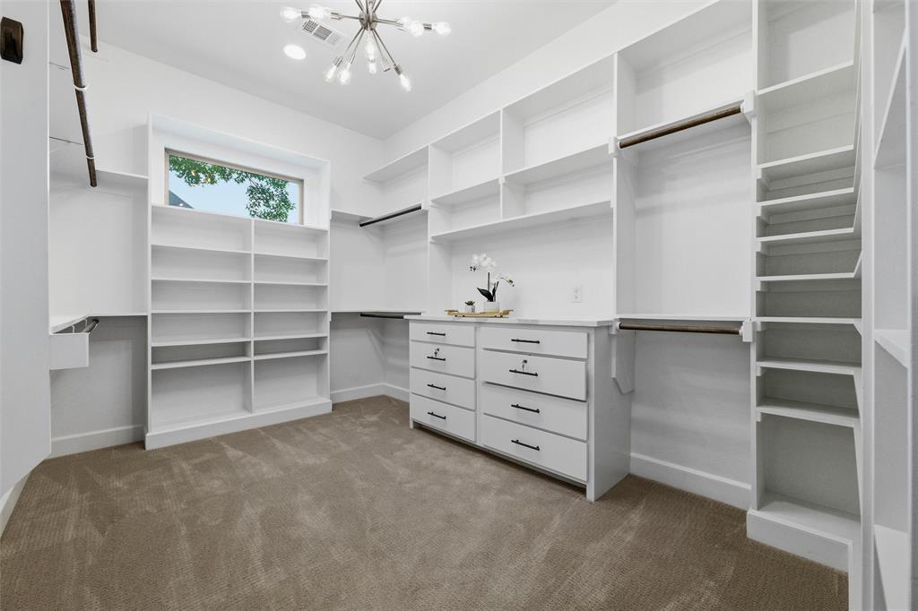 1019 Country Way Rowlett, TX 75089 - Photo 19 of 40 Primary Closet with laundray room access