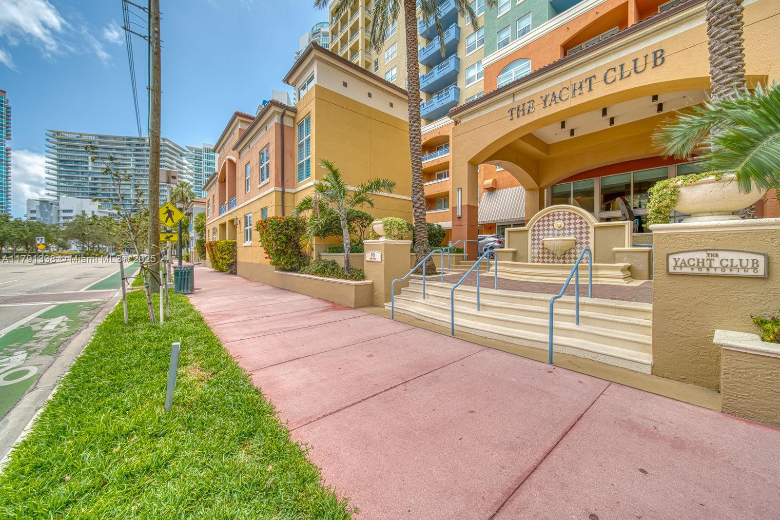 90 Alton Road, Unit TH2 Miami Beach, FL 33139 - Photo 31 of 32 a view of a street with a building in the background