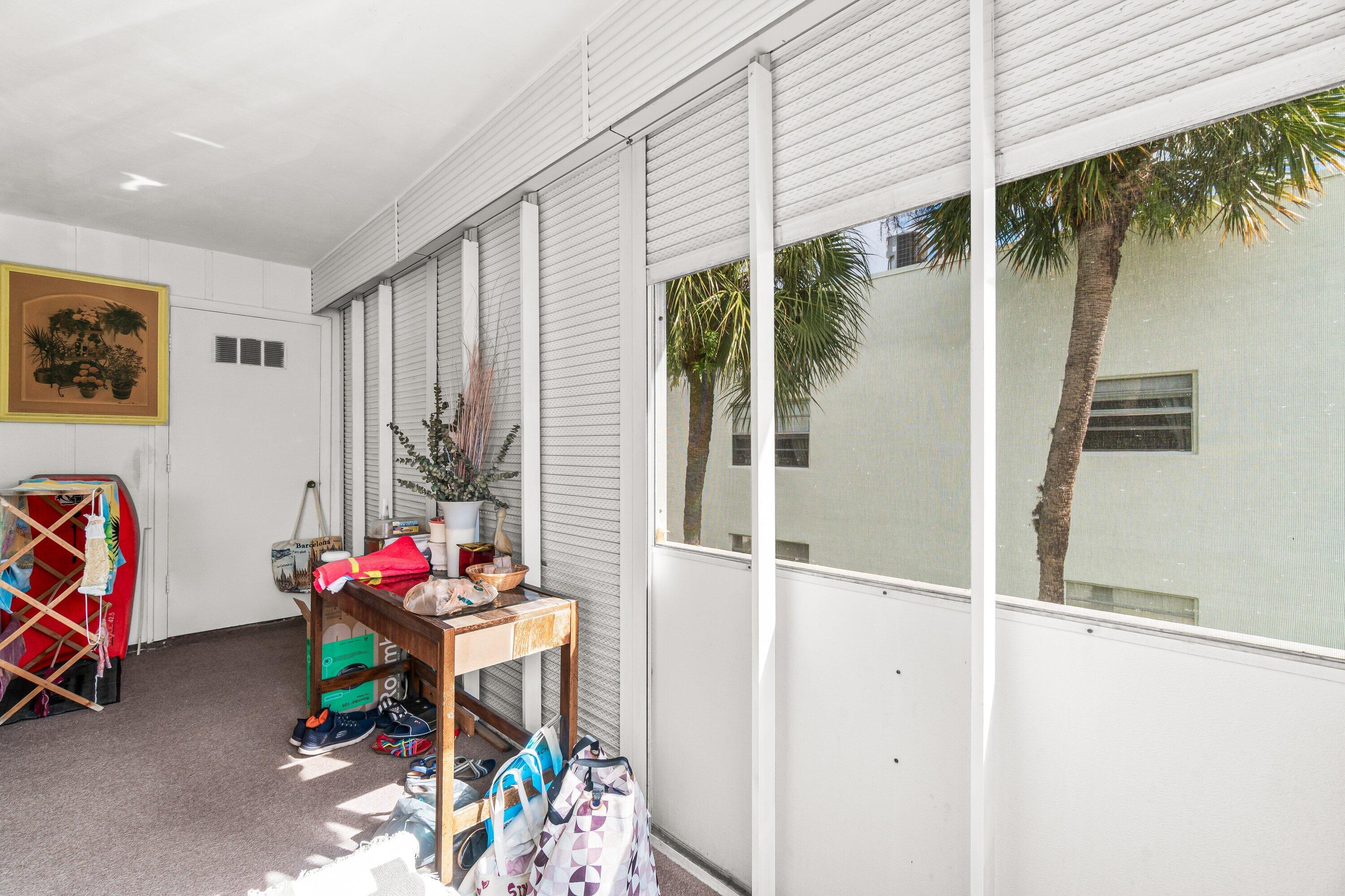 508 Normandy Lane, Unit 508 Delray Beach, FL 33484 - Photo 14 of 25 a view of an outdoor space with porch