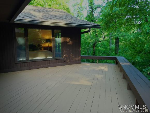 681 Laurel Ridge Road Columbus, NC 28722 - Photo 11 of 24 a view of outdoor space with deck and yard