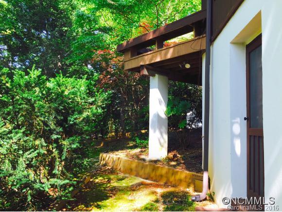 681 Laurel Ridge Road Columbus, NC 28722 - Photo 13 of 24 a view of a door of the house