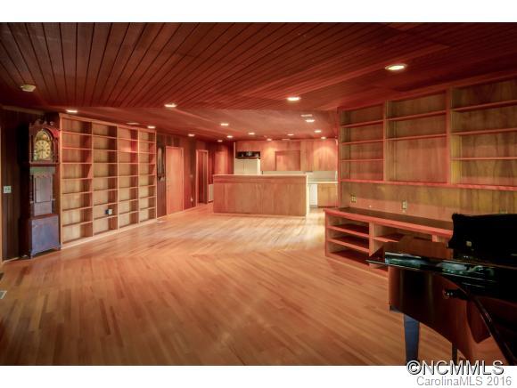 681 Laurel Ridge Road Columbus, NC 28722 - Photo 5 of 24 a view of a room with racks on the wall