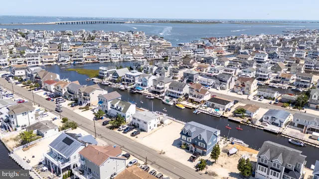 an aerial view of a city with ocean view