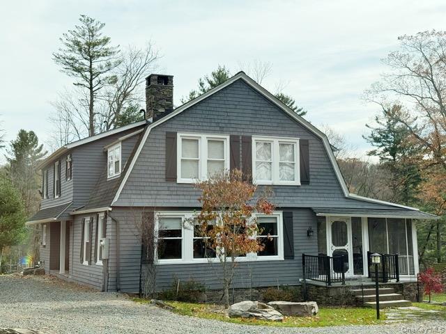 57 Inn Road Forestburgh, NY 12777 - Photo 3 of 49 a front view of a house with a yard