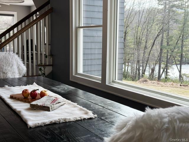 57 Inn Road Forestburgh, NY 12777 - Photo 5 of 49 a bed sitting in a bedroom next to a window