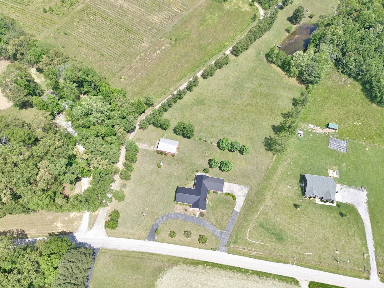 4929 Fountain Grove Road Morrison, TN 37357 - Photo 5 of 33 an aerial view of a house with a yard