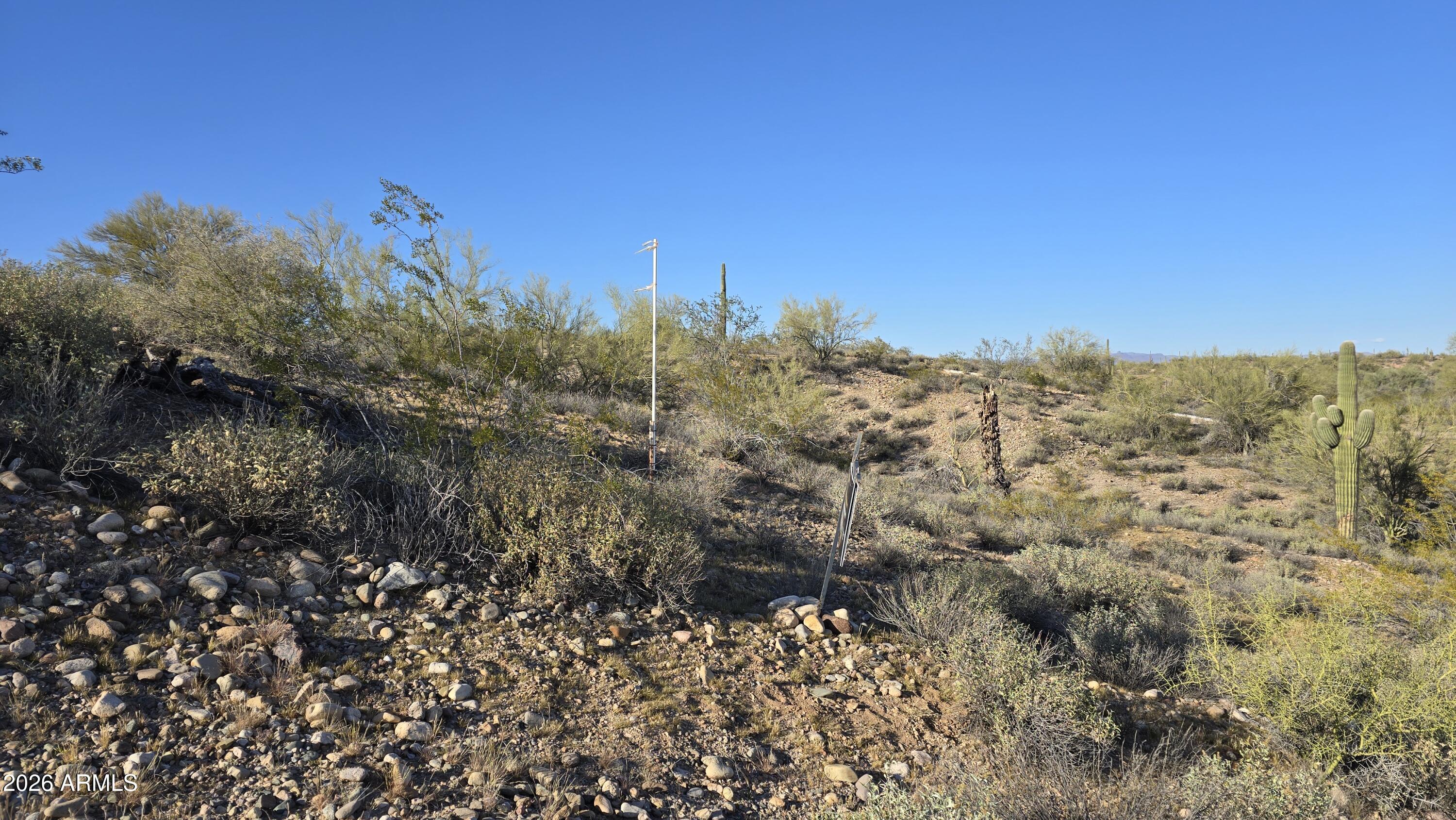 280-xx West Dove Valley Road, Unit 6 PARCELS Wittmann, AZ 85361 - Photo 2 of 25 a view of a lake with a mountain in the background