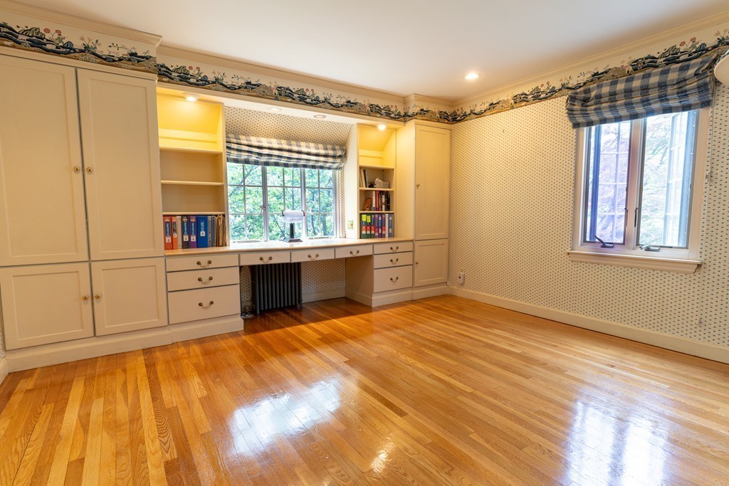 9 Penniman Road Brookline, MA 02445 - Photo 11 of 17 a view of a kitchen with wooden floor and cabinet