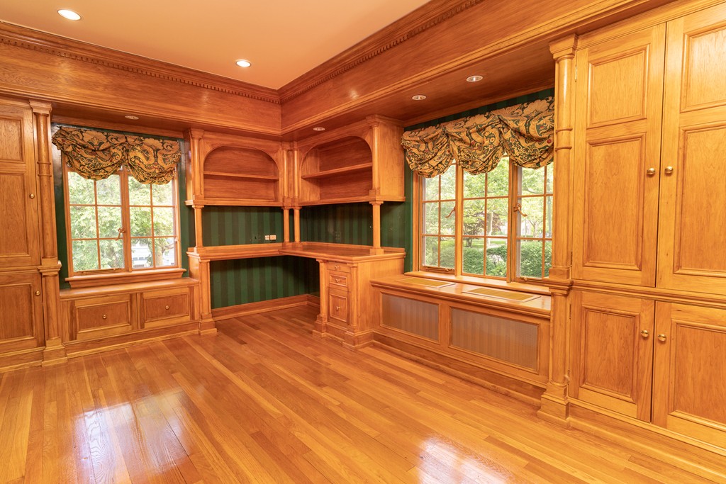 9 Penniman Road Brookline, MA 02445 - Photo 12 of 17 a view of an empty room with window and wooden floor