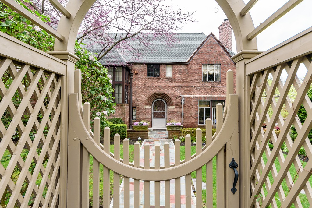 9 Penniman Road Brookline, MA 02445 - Photo 14 of 17 a front view of a house with garden