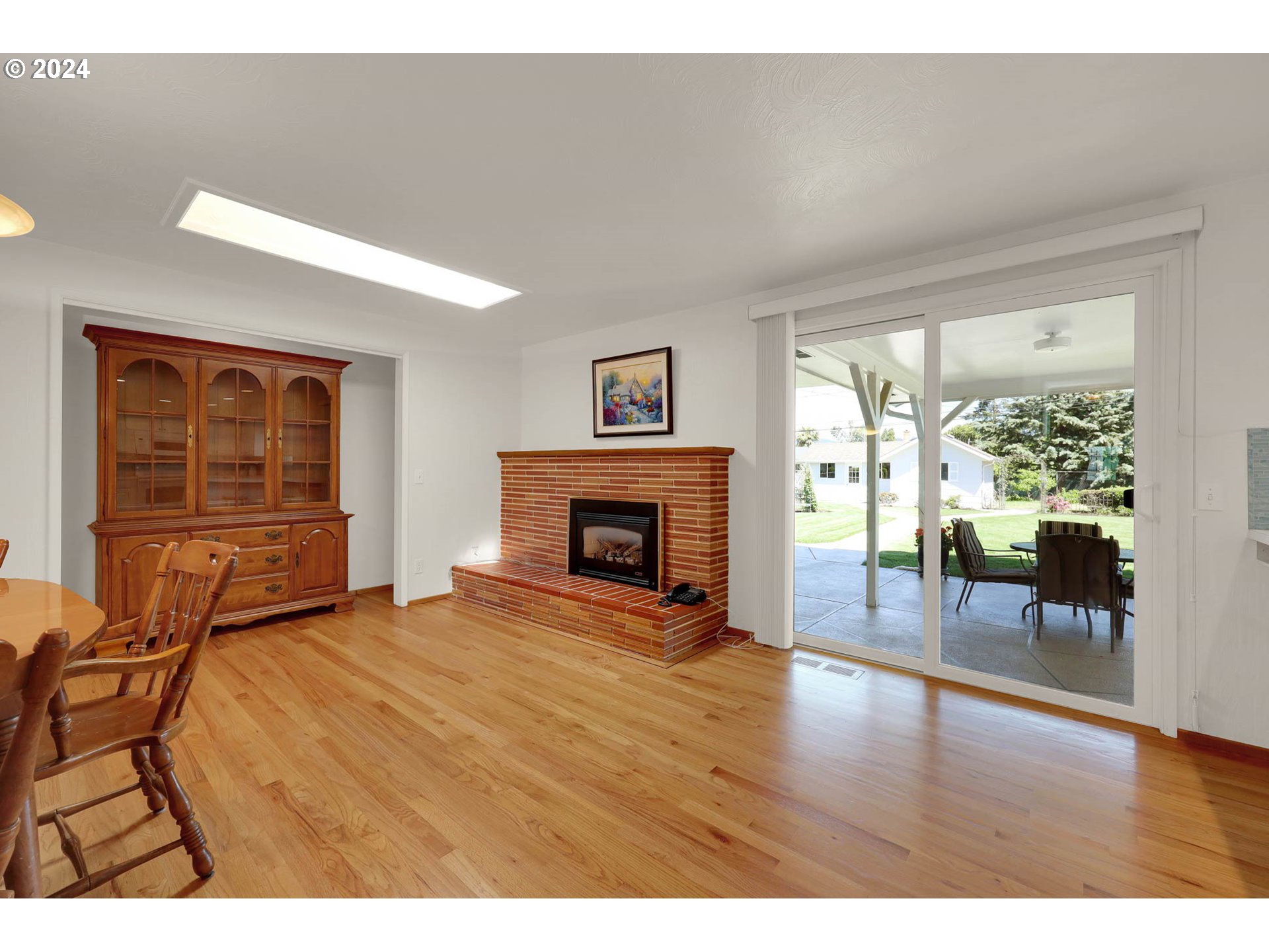 2411 15th Street Springfield, OR 97477 - Photo 5 of 18 a view of a livingroom with furniture and a fireplace