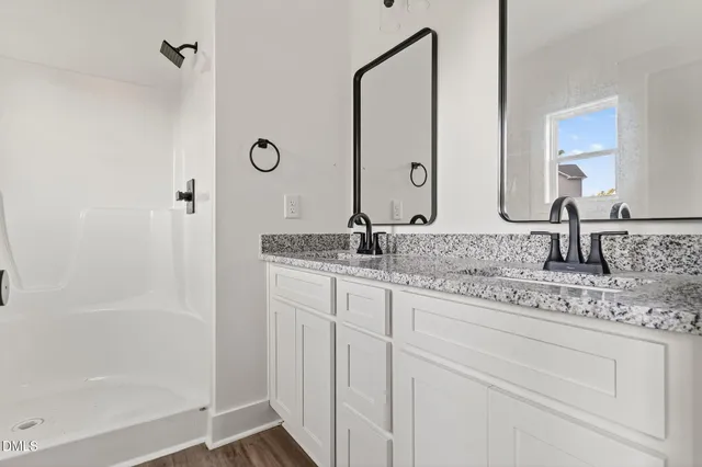 a view of a livingroom with a ceiling fan