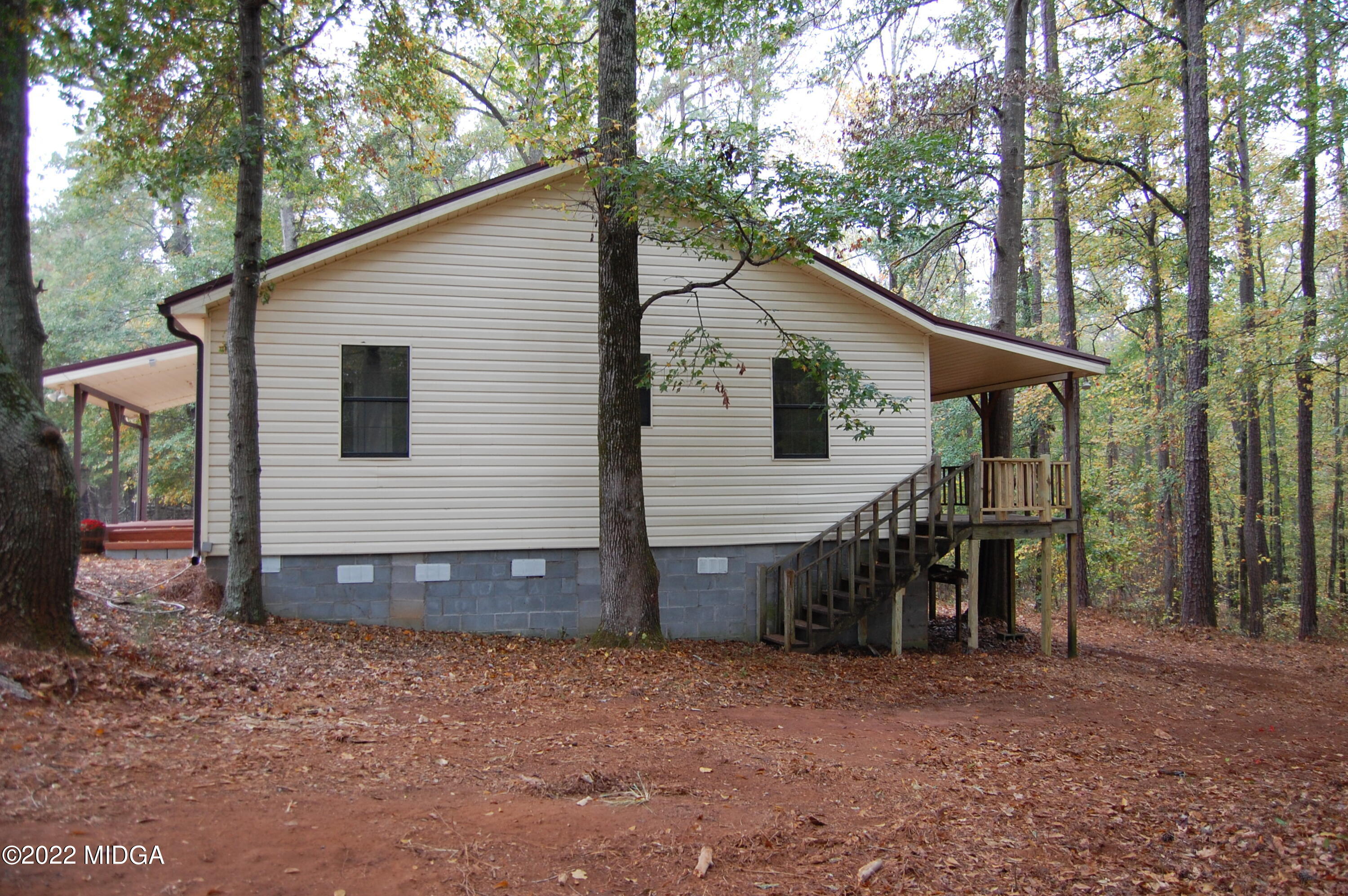 1387 Old Zebulon Road Forsyth, GA 31029 - Photo 3 of 21 Right Side