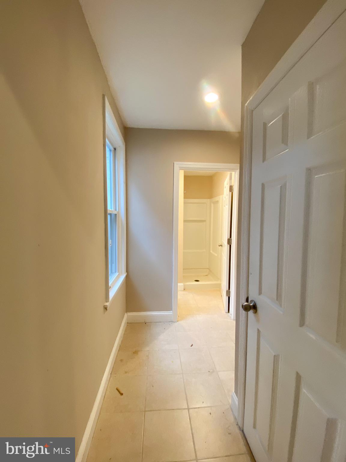 40 High Street Woodbury, NJ 08096 - Photo 2 of 13 Hall to kitchen and bath