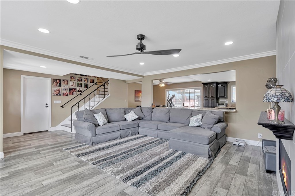 23682 Cavanaugh Road Lake Forest, CA 92630 - Photo 12 of 51 a living room with furniture and a ceiling fan