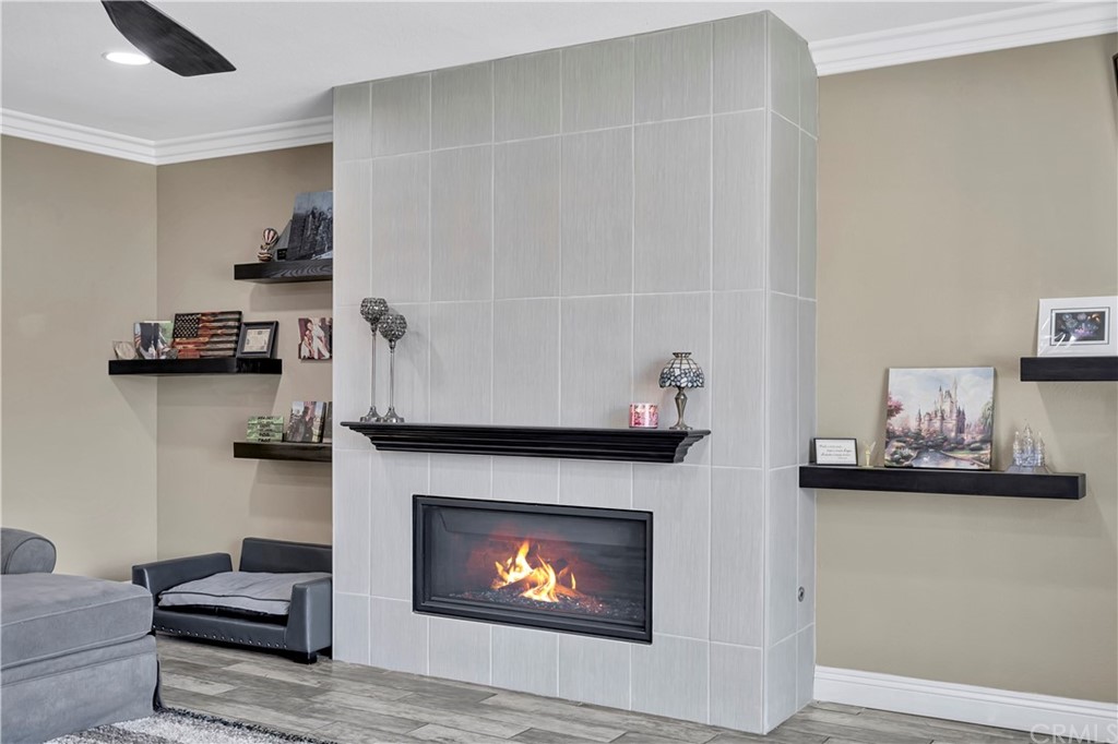 23682 Cavanaugh Road Lake Forest, CA 92630 - Photo 15 of 51 a living room with furniture and a fireplace