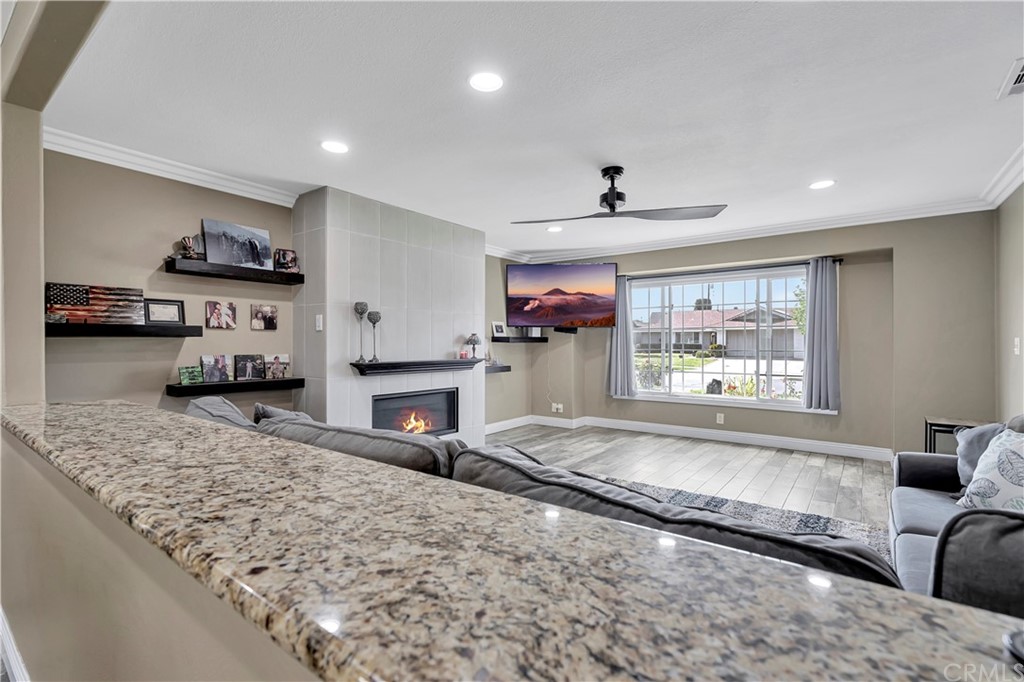 23682 Cavanaugh Road Lake Forest, CA 92630 - Photo 23 of 51 a living room with furniture and a flat screen tv
