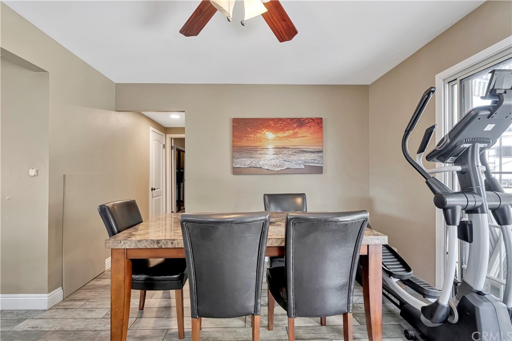 23682 Cavanaugh Road Lake Forest, CA 92630 - Photo 25 of 51 a view of a dining room with furniture