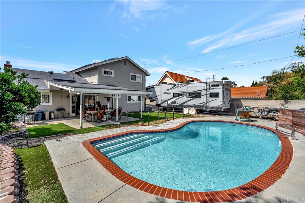 23682 Cavanaugh Road Lake Forest, CA 92630 - Photo 43 of 51 a view of a house with swimming pool and sitting area
