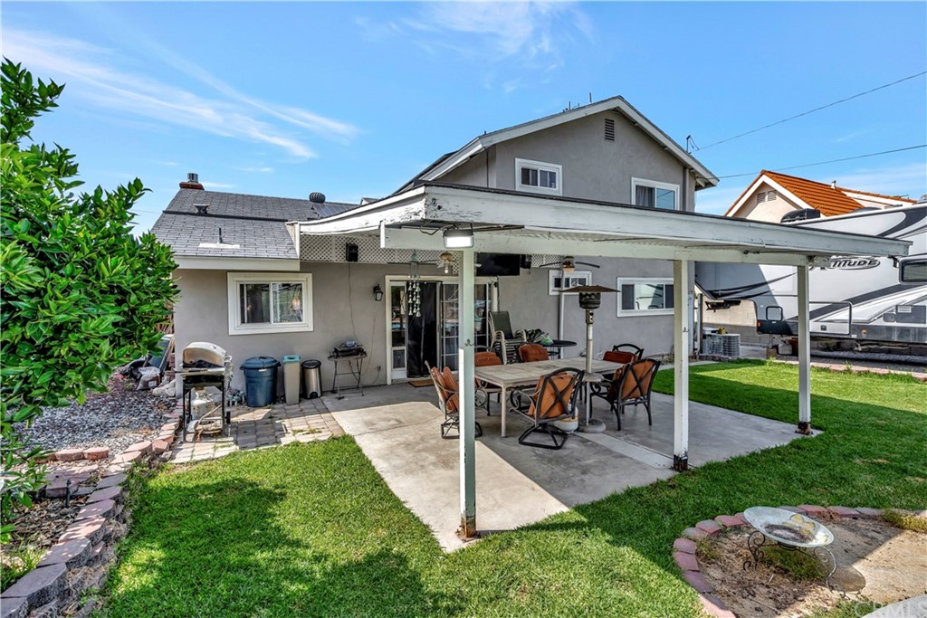 23682 Cavanaugh Road Lake Forest, CA 92630 - Photo 45 of 51 a view of a house with a yard porch and sitting area