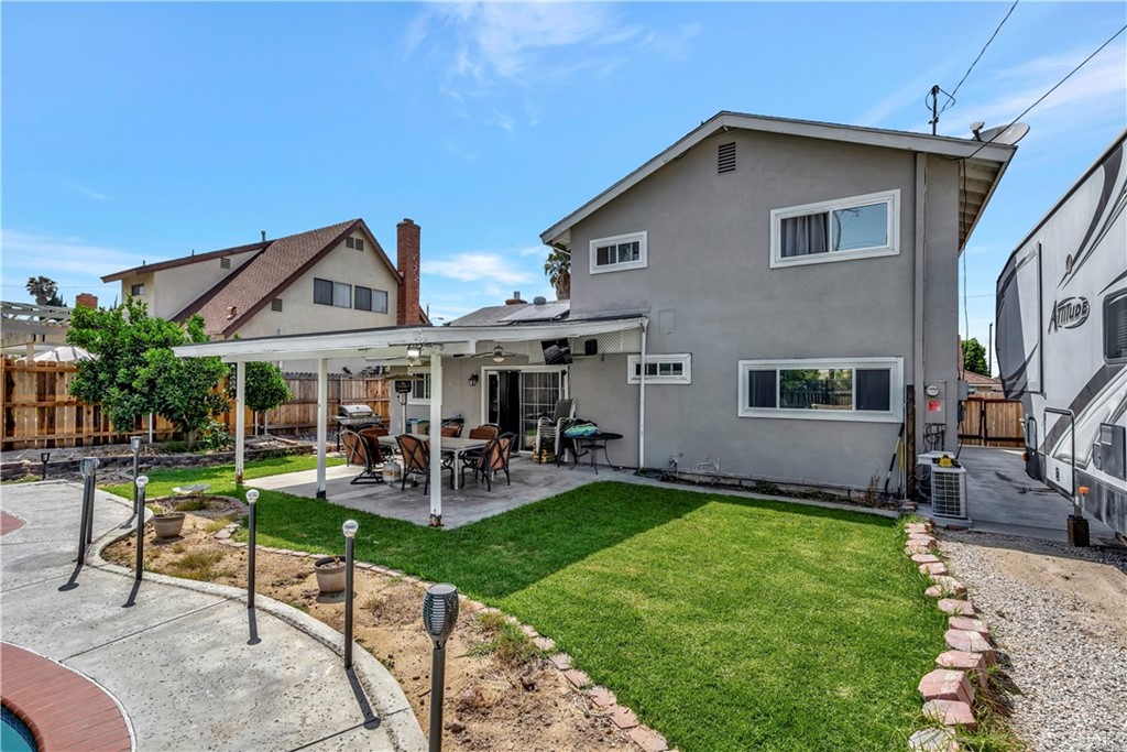 23682 Cavanaugh Road Lake Forest, CA 92630 - Photo 46 of 51 a view of a house with a yard patio and sitting area