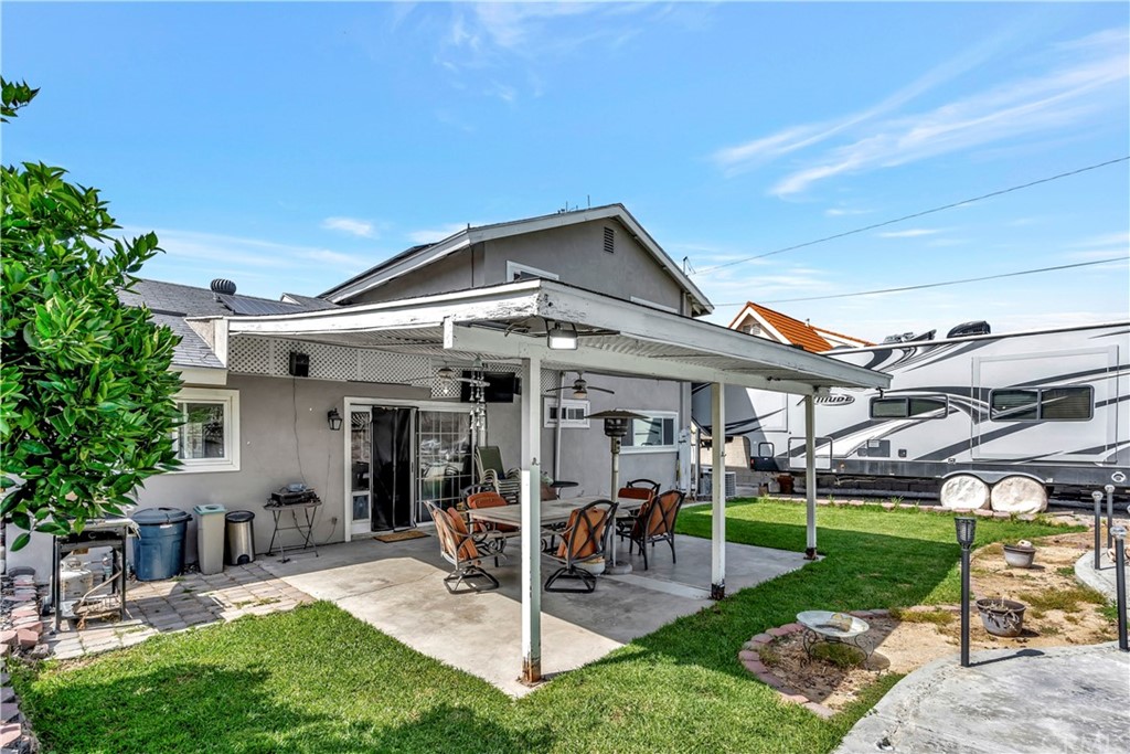 23682 Cavanaugh Road Lake Forest, CA 92630 - Photo 48 of 51 a view of a house with a yard patio and sitting area