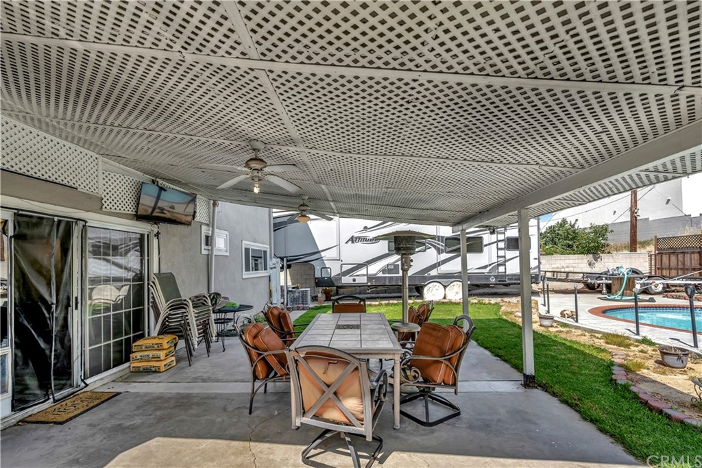 23682 Cavanaugh Road Lake Forest, CA 92630 - Photo 49 of 51 a view of a chairs and table in a patio