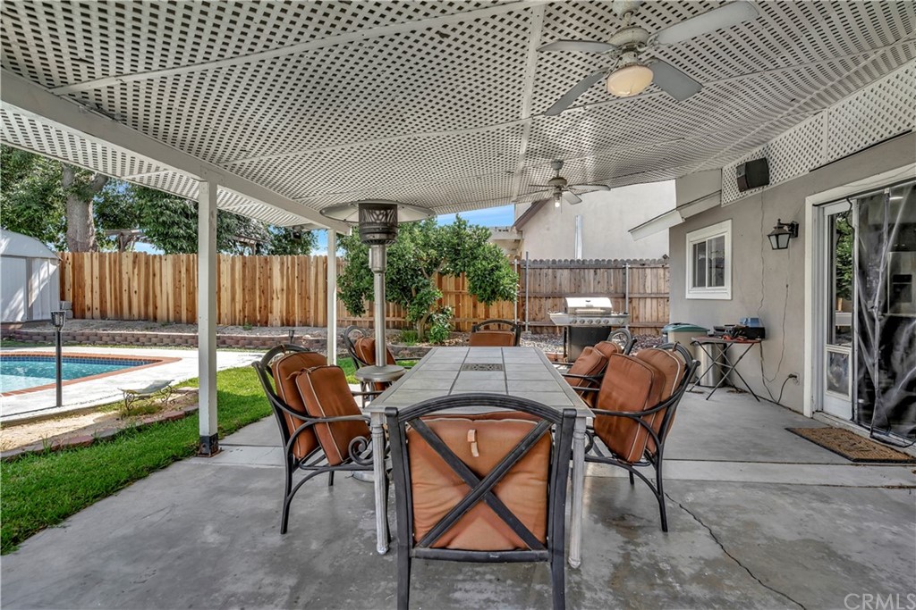 23682 Cavanaugh Road Lake Forest, CA 92630 - Photo 51 of 51 a view of a patio with table and chairs and wooden fence