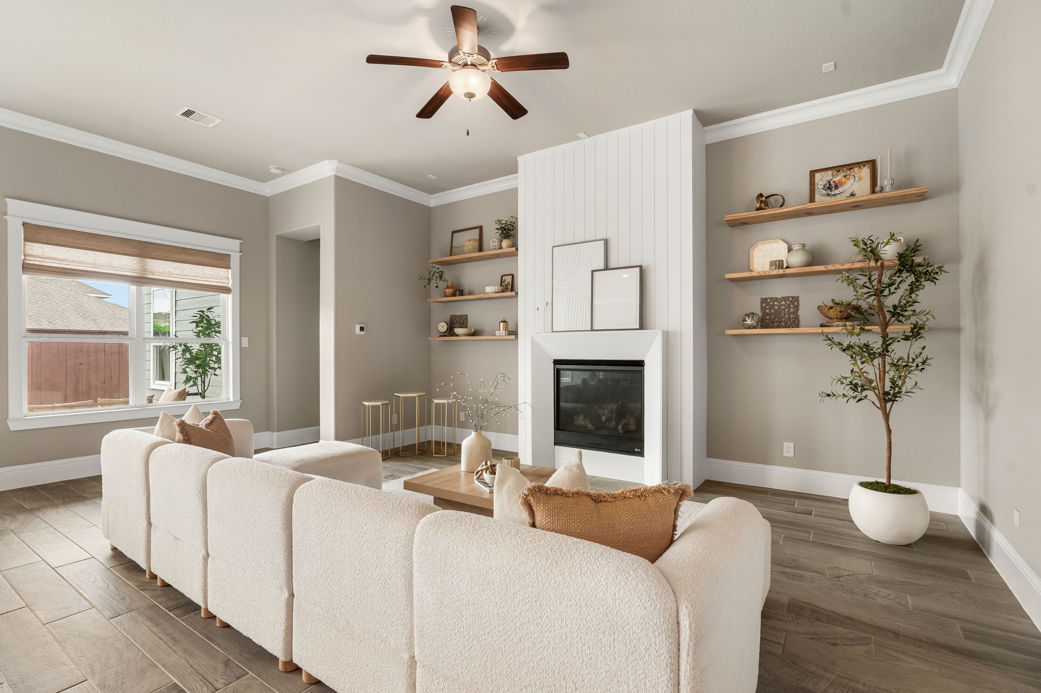2206 Rope Maker Road Conroe, TX 77384 - Photo 19 of 42 Light-filled living area with elevated finishes and open-concept flow designed for comfort.