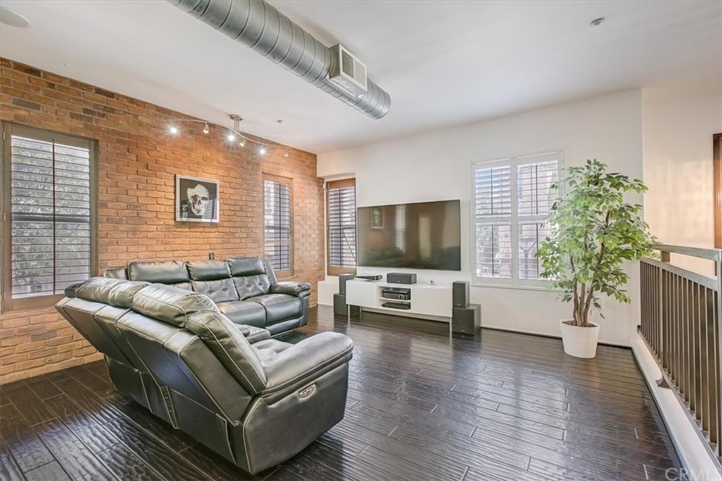 326 District Court Fullerton, CA 92832 - Photo 12 of 41 a living room with furniture and a flat screen tv