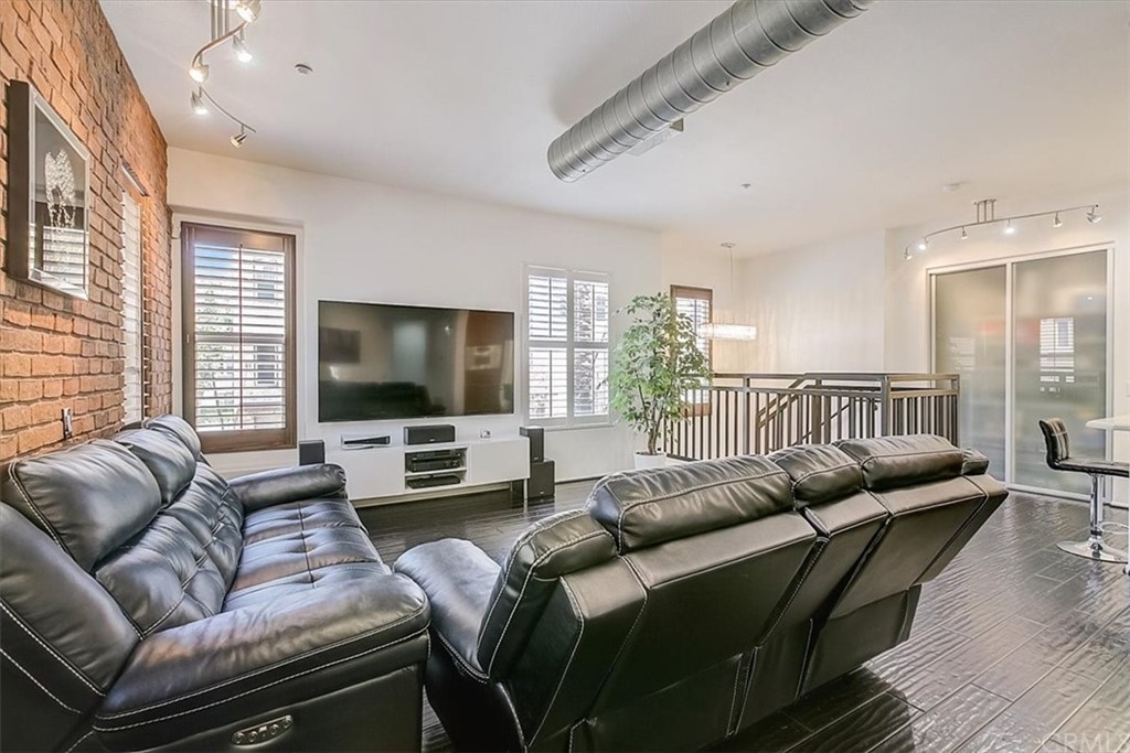 326 District Court Fullerton, CA 92832 - Photo 13 of 41 a living room with furniture and a flat screen tv