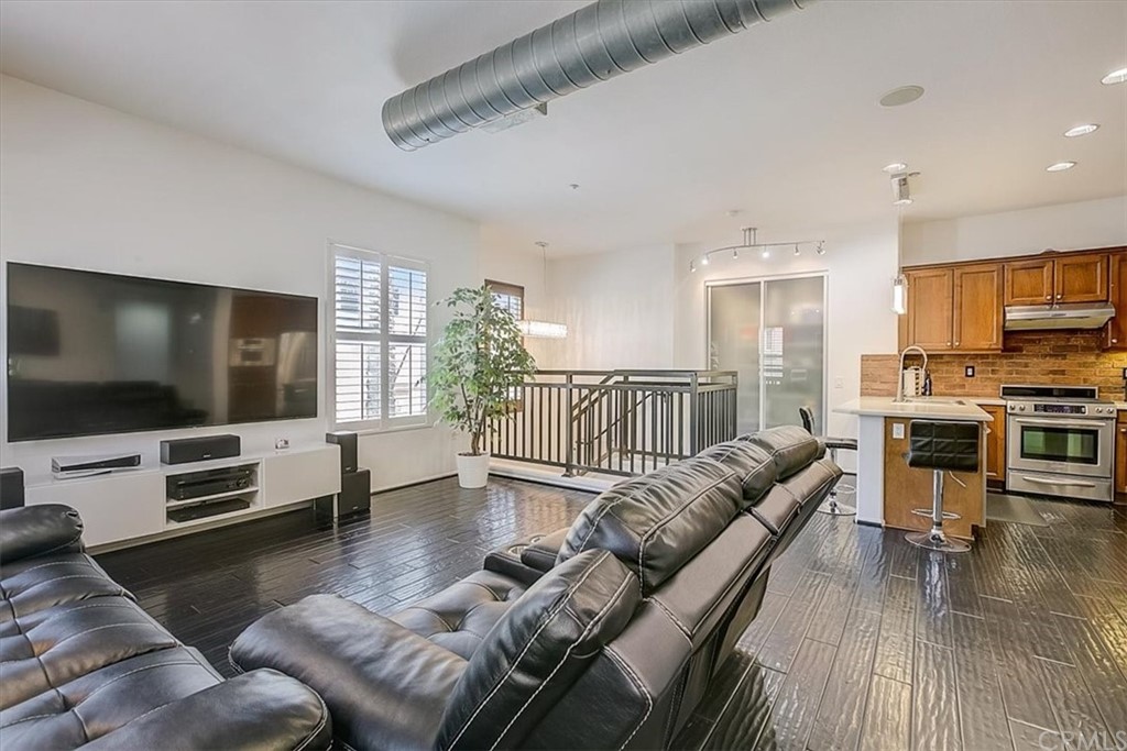 326 District Court Fullerton, CA 92832 - Photo 14 of 41 a living room with furniture and a flat screen tv
