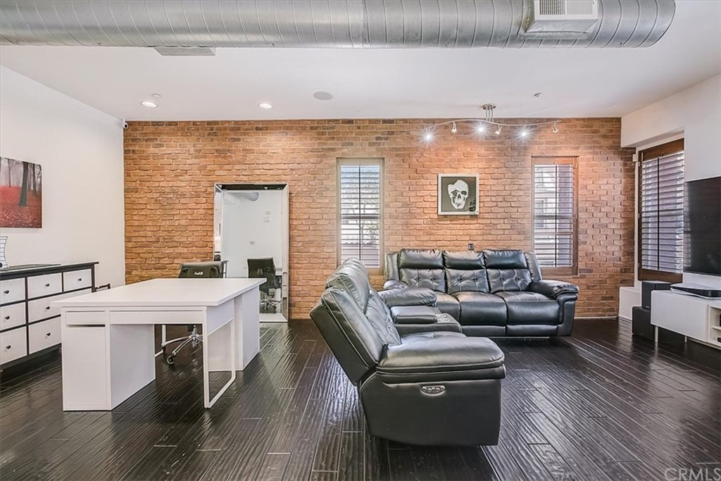 326 District Court Fullerton, CA 92832 - Photo 15 of 41 a living room with furniture and wooden floor